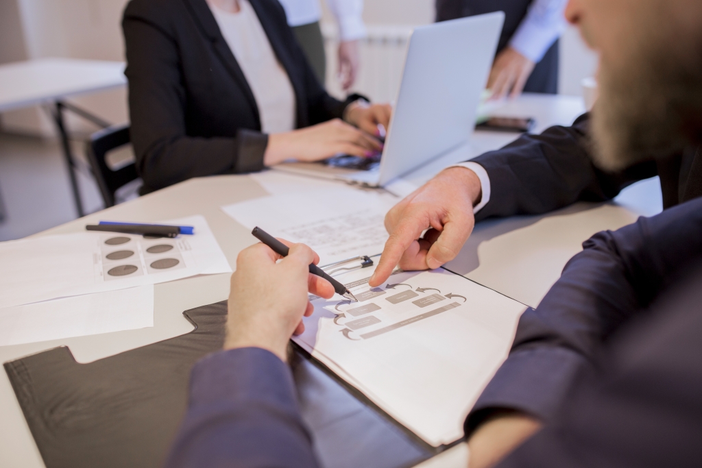 close-up-businesspeople-hands-discussion-business-plan