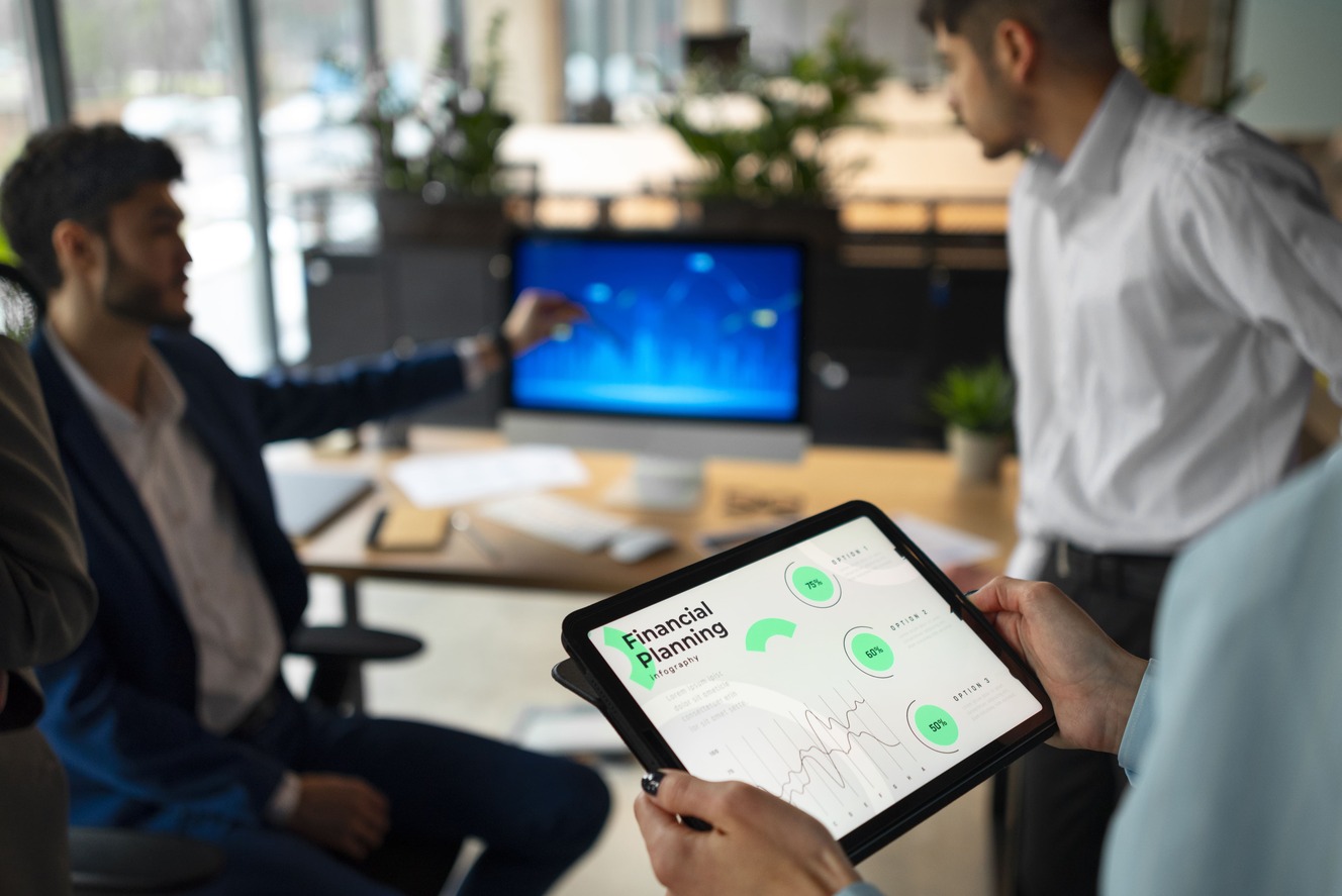 people-office-analyzing-checking-finance-graphs-min